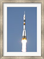 The Soyuz TMA-12 Spacecraft Lifts Off into a Cloudless Sky Fine Art Print