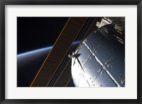 A Portion of the International Space Station's Columbus Laboratory and Solar Array Panels Fine Art Print