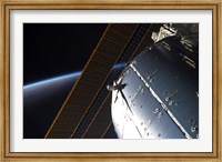 A Portion of the International Space Station's Columbus Laboratory and Solar Array Panels Fine Art Print