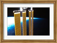 A Partial View of International Space Station Solar Panels and Earth's Horizon Fine Art Print