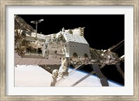 The Canadian-Built Dextre Robotic System in the Grasp of the Robotic Canadarm2 Fine Art Print