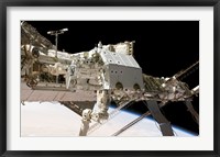 The Canadian-Built Dextre Robotic System in the Grasp of the Robotic Canadarm2 Fine Art Print