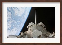 Space Shuttle Discovery's Payload Bay Backdropped by Earth's Horizon Fine Art Print