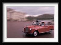 Cab racing past Buckingham Palace, London, England Fine Art Print