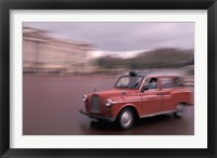 Cab racing past Buckingham Palace, London, England Fine Art Print
