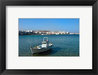 Mykonos, Greece Boat off the island with view of the city behind Fine Art Print