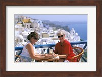 Women Having Coffee on Cafe Terrace, Santorini, Greece Fine Art Print