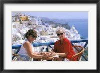 Women Having Coffee on Cafe Terrace, Santorini, Greece Fine Art Print