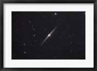 NGC 4565, an edge-on unbarred spiral galaxy in the Constellation Coma Berenices Fine Art Print