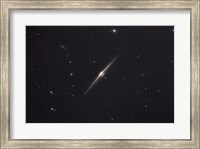 NGC 4565, an edge-on unbarred spiral galaxy in the Constellation Coma Berenices Fine Art Print