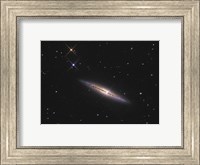 NGC 4013 is an edge-on unbarred spiral galaxy in the Constellation Ursa Major Fine Art Print