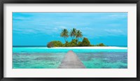 Jetty and Maldivian island Framed Print