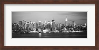 Skyscrapers lit up at night in a city, Manhattan, NY Fine Art Print