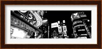 Low angle view of buildings lit up at night, Tokyo, Japan Fine Art Print