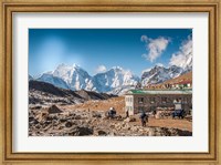Trekkers and yaks in Lobuche on a trail to Mt Everest Fine Art Print