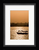 Egypt, Luxor Water taxi at sunset Nile River Fine Art Print
