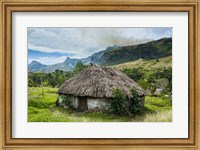 Traditional thatched roofed huts in Navala in the Ba Highlands, Fiji Fine Art Print