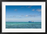 Fishing boat in the turquoise waters of the blue lagoon, Yasawa, Fiji, South Pacific Fine Art Print