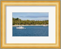 Little sailboat in the blue lagoon, Yasawa, Fiji, South Pacific Fine Art Print