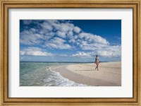 Woman walking on white sand beach of Beachcomber Island, Mamanucas Islands, Fiji Fine Art Print