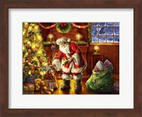 Santa putting gifts under tree Fine Art Print