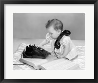 1960s Baby Girl With Telephone Book Fine Art Print