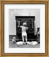 1940s Toddler Baby Pulling Clothes Out Of Bureau Fine Art Print