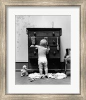 1940s Toddler Baby Pulling Clothes Out Of Bureau Fine Art Print