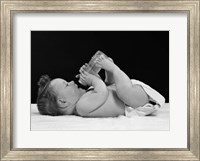 1950s Baby Lying On Back Drinking From Bottle Fine Art Print