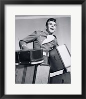 1950s Smiling Bellboy Carrying Four Bags Of Luggage Fine Art Print