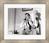 1950s Father Holding Baby While On The Phone Fine Art Print