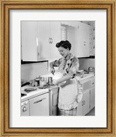 1950s Housewife In Kitchen Mixing Ingredients Fine Art Print