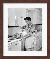 1950s Housewife In Kitchen Mixing Ingredients Fine Art Print