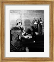 1920s  Woman With Pen To Lips Wearing Cloche Hat Fine Art Print