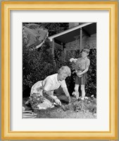 1960s Boy Helping Grandmother Plant Flowers Fine Art Print