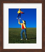 1990S Father Tossing Daughter Up In The Air Fine Art Print