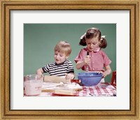 1960s  Boy And Girl Mixing Ingredients For Cookies Fine Art Print