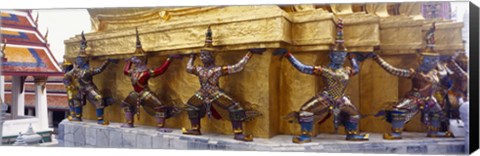 Framed Statues at base of golden chedi, The Grand Palace, Bangkok, Thailand Print