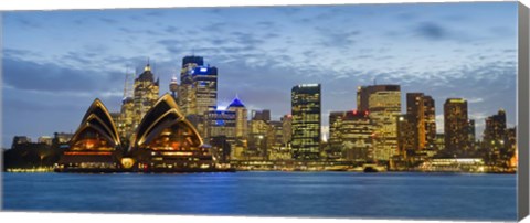 Framed Opera house and buildings lit up at dusk, Sydney Opera House, Sydney Harbor, Sydney, New South Wales, Australia Print