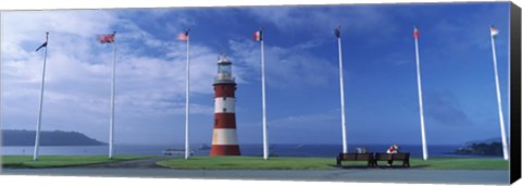 Framed Lighthouse with flags on the coast, Smeaton&#39;s Tower, Plymouth Hoe, Plymouth, Devon, England Print