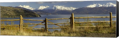 Framed Fence in front of a lake with mountains in the background, Lake General Carrera, Andes, Patagonia, Chile Print