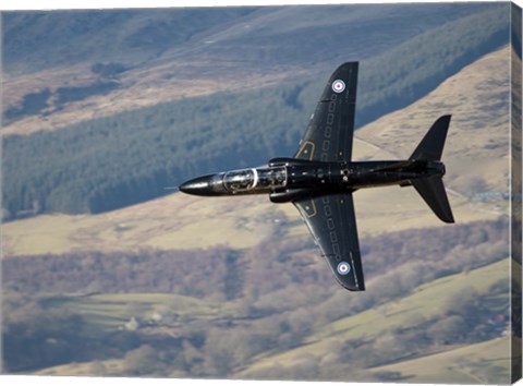 Framed Hawk T1 trainer aircraft of the Royal Air Force low flying over North Wales Print