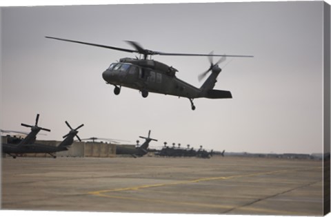 Framed UH-60 Black Hawk Taking off for a Mission Over Northern Iraq Print