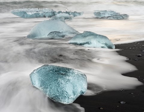 Framed Icebergs On Black Volcanic Beach Near The Jokulsarlon Glacial Lagoon In The Vatnajokull National Park, Iceland Print