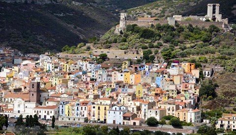 Framed Pastel-Colored Buildings And Malaspina Castle In Bosa, Sardinia, Italy Print