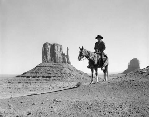 Framed Navajo Indian In Cowboy Hat On Horseback With Monument Valley Rock Formations In Background Print