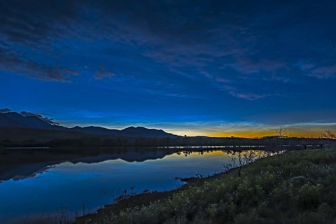 Framed Noctilucent Clouds Glowing and Reflected in Calm Waters of the Waterton River Print