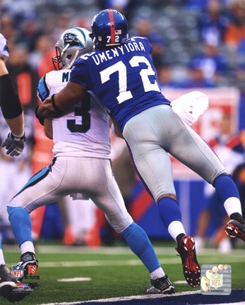 Framed Osi Umenyiora 2010 Action Print