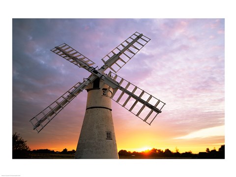 Framed Boats moored near a traditional windmill, Horsey Windpump, Horsey, Norfolk Broads, Norfolk, England Print