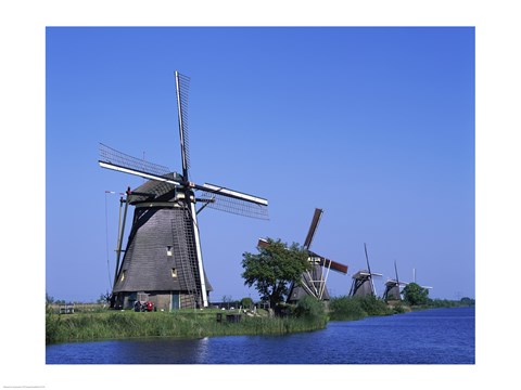 Framed Windmills along a river, Kinderdike, Amsterdam, Netherlands Print